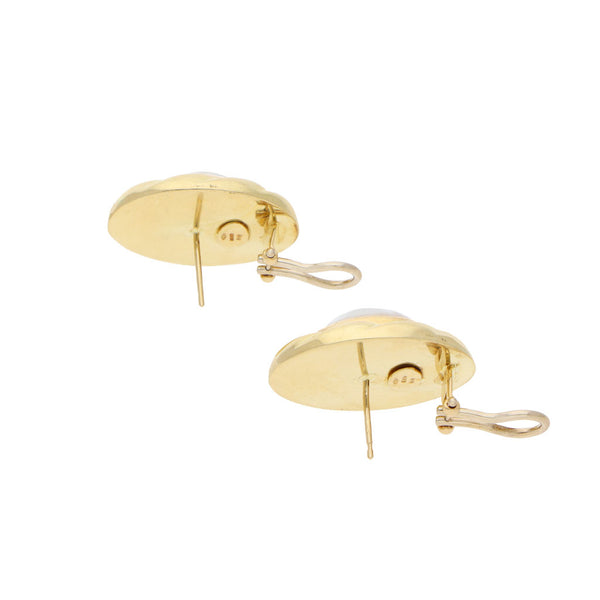 Aretes huecos con perlas en oro dos tonos 18 kilates.