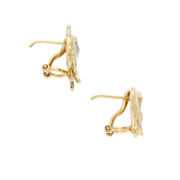 Aretes diseño especial motivo elefante con circonias en oro amarillo 14 kilates.