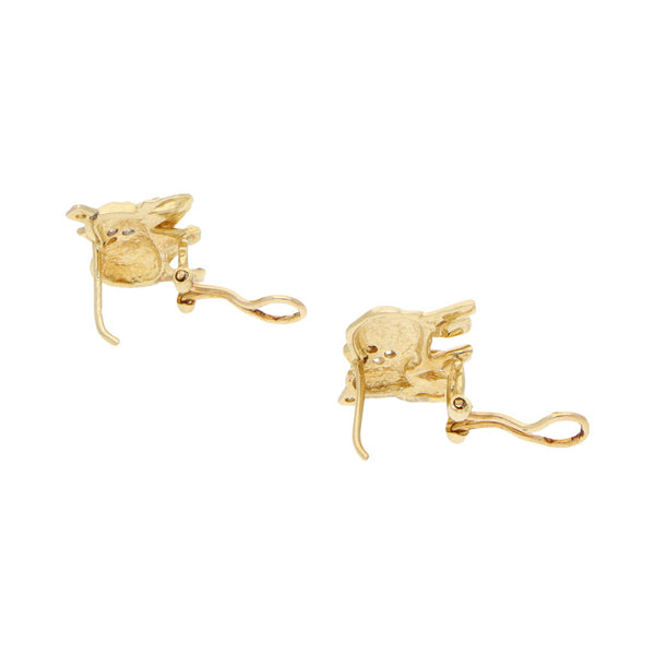 Aretes diseño especial motivo elefante con circonias en oro amarillo 14 kilates.