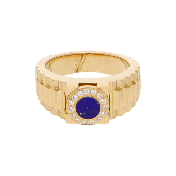 Anillo estilizado con diamantes y lapislazuli en oro amarillo 18 kilates.