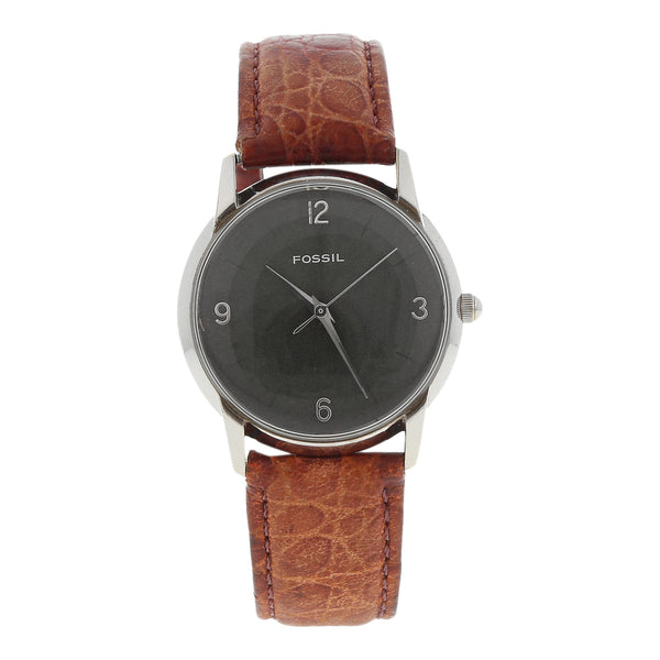 Reloj Fossil para dama en caja acero inoxidable correa piel.