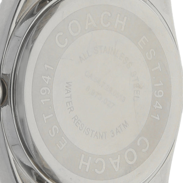 Reloj Coach para dama en acero inoxidable.