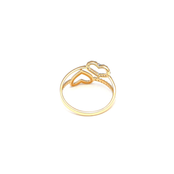 Anillo calado motivo corazones con sintéticos en oro amarillo 14 kilates.