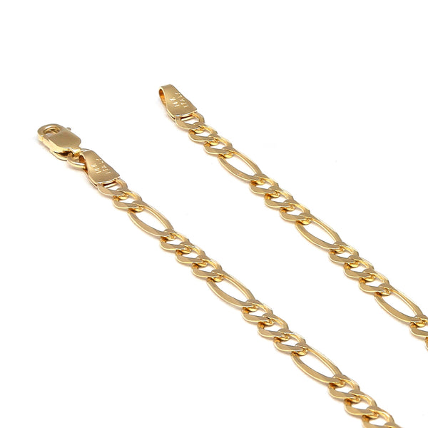 Pulsera de tres eslabones por uno en oro amarillo 14 kilates.