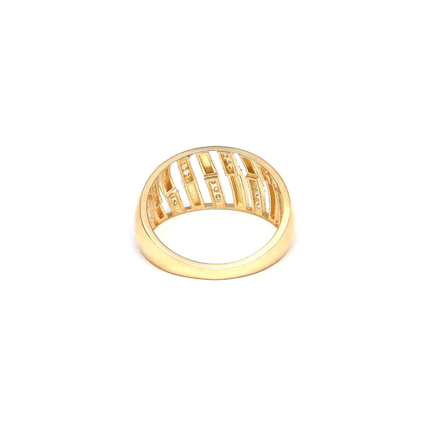 Anillo calado con circonias en oro amarillo 14 kilates.