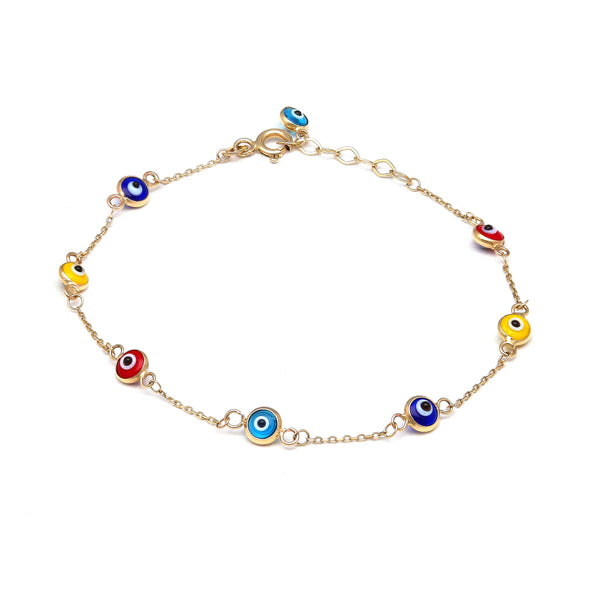 Pulsera eslabón combinado con aplicaciones motivo ojo y sintéticos en oro amarillo 14 kilates.