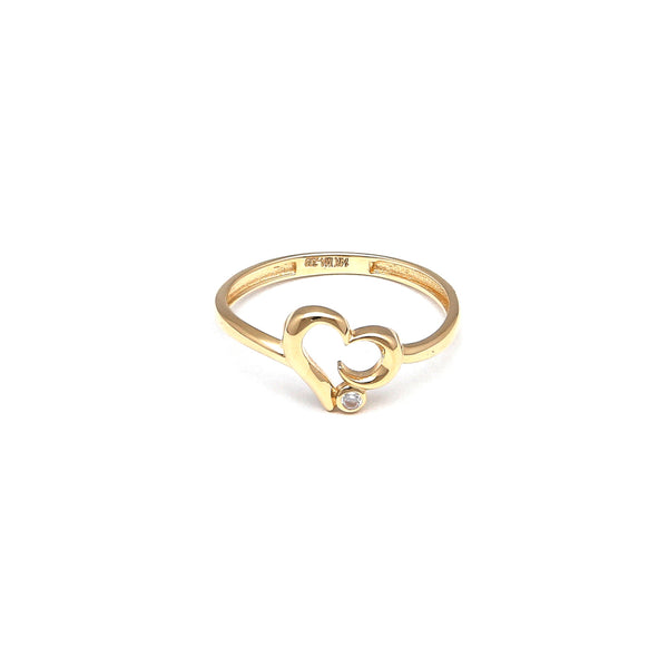 Anillo calado motivo corazón con circonia en oro amarillo 14 kilates.