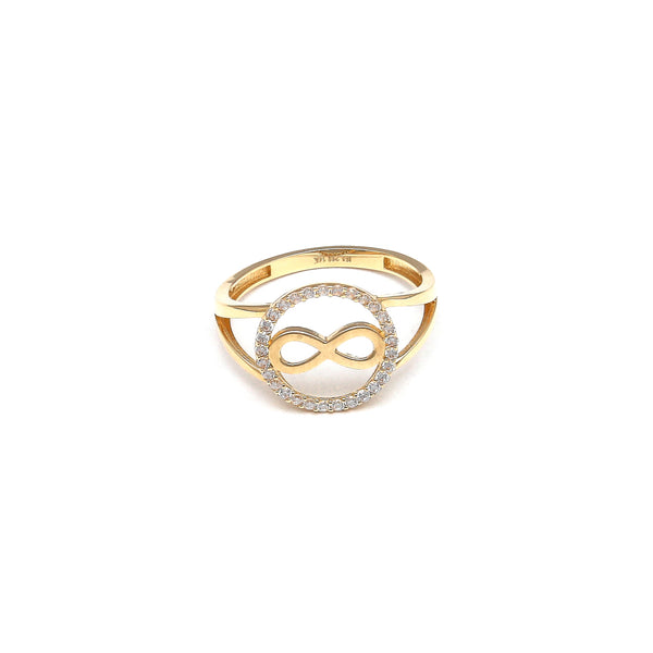 Anillo calado motivo infinito con circonias en oro amarillo 14 kilates.