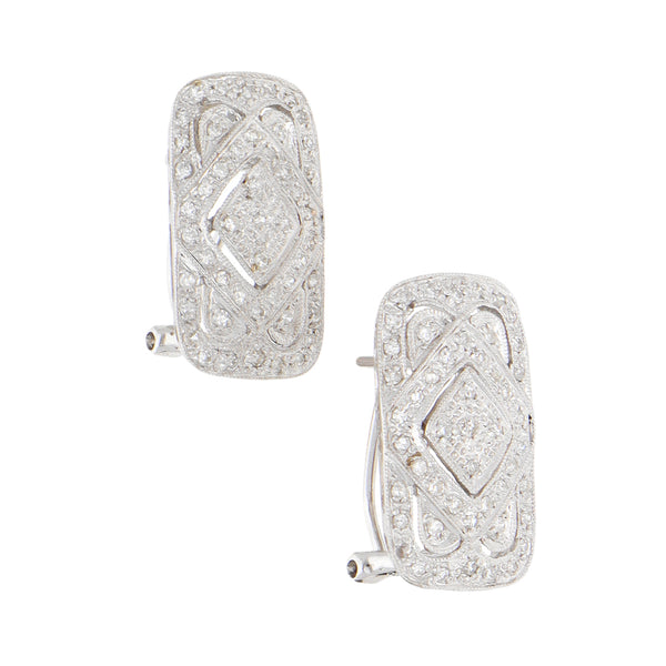 Aretes estilizados con diamantes en oro blanco 14 kilates.