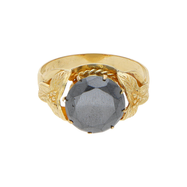 Anillo diseño especial motivo floral con acerina en oro amarillo 18 kilates.