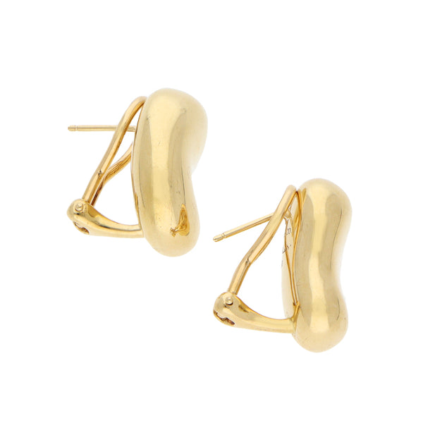 Aretes diseño especial firma Tiffany & Co en oro amarillo 18 kilates.