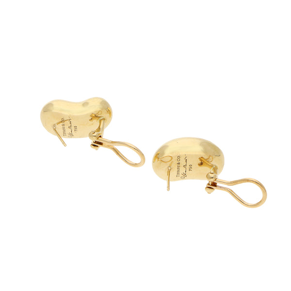 Aretes diseño especial firma Tiffany & Co en oro amarillo 18 kilates.