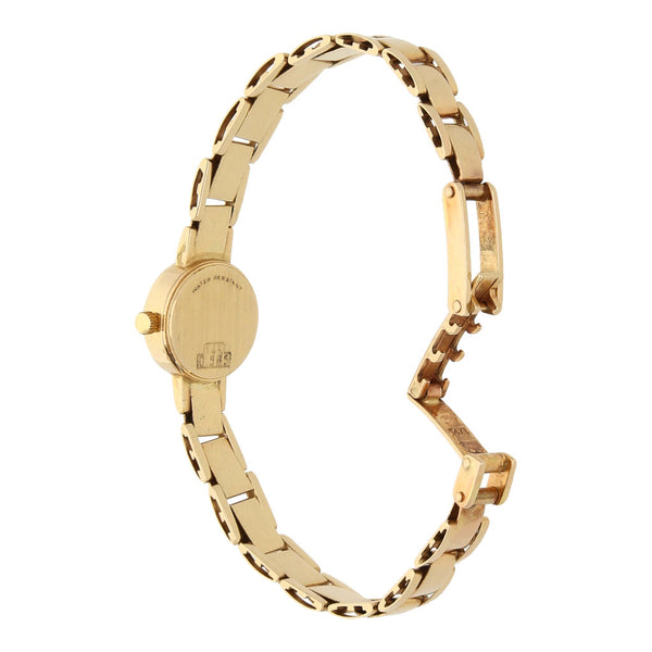 Reloj Guvier para dama en oro amarillo 14 kilates.