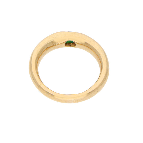 Anillo diseño especial con esmeralda en oro amarillo 18 kilates.