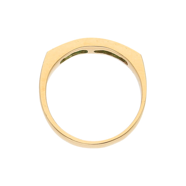 Anillo diseño especial con esmeraldas en oro amarillo 18 kilates.