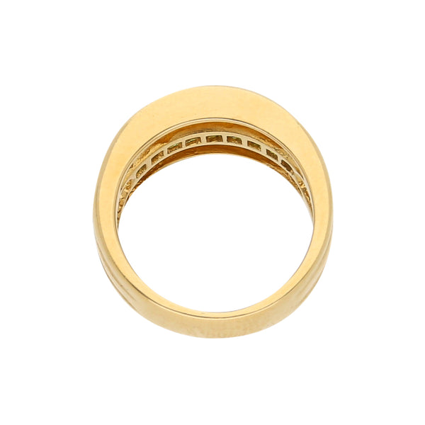 Anillo estilizado con esmeraldas en oro amarillo 18 kilates.