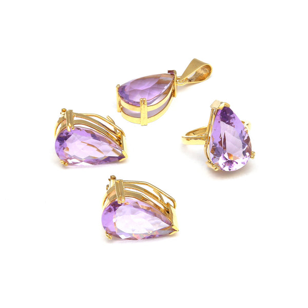 Juego de anillo, aretes y dije calados con amatistas lavanda en oro amarillo 14 kilates.