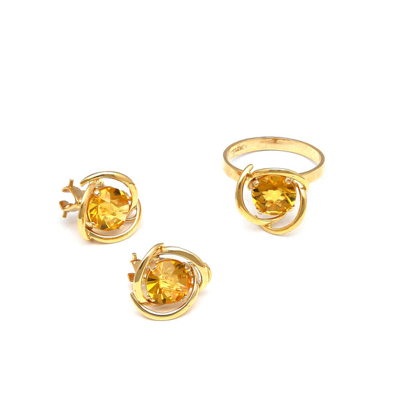 Juego de anillo y aretes calados con citrinos en oro amarillo 14 kilates.