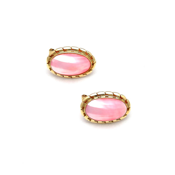 Aretes calados con medias perlas osmeña rosa en oro amarillo 14 kilates.