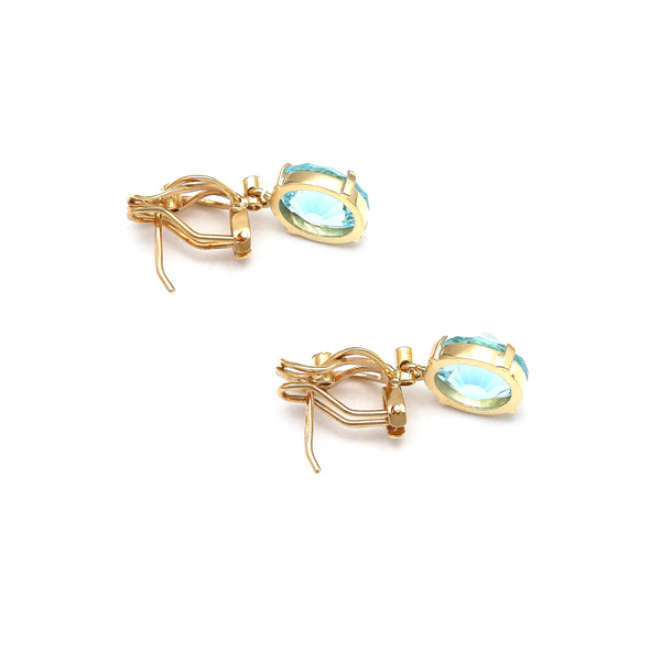 Aretes articulados con diamantes y topacio azul en oro amarillo 14 kilates.