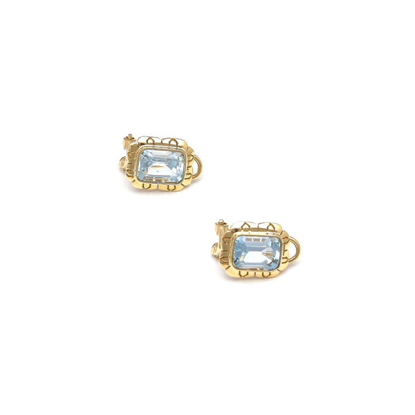Aretes calados con topacios azules en oro amarillo 14 kilates.