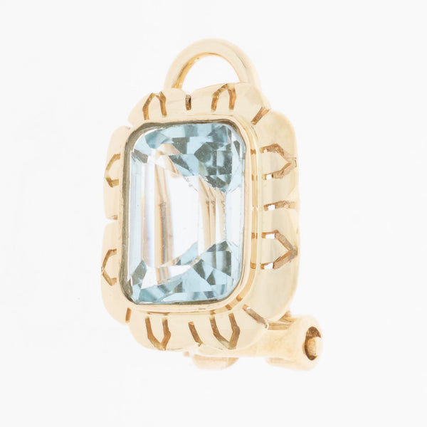 Aretes calados con topacios azules en oro amarillo 14 kilates.