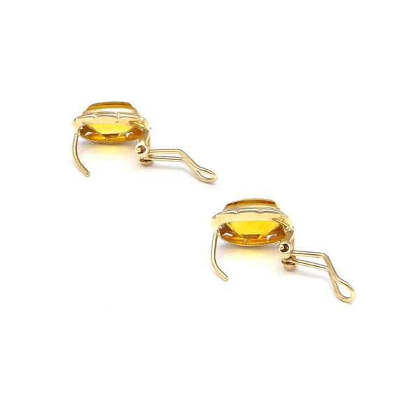 Juego de anillo y aretes calados con citrinos en oro amarillo 14 kilates.