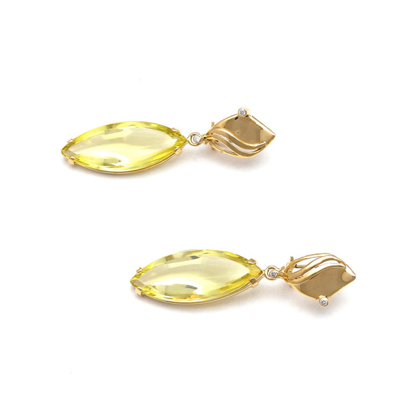 Aretes diseño especial con colgantes, citrino limón y circonias en oro amarillo 14 kilates.