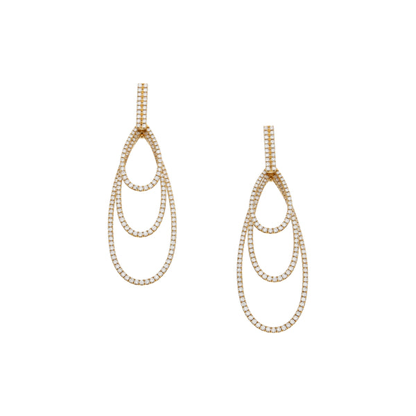 Aretes estilizados con colgantes y diamantes en oro amarillo 18 kilates.