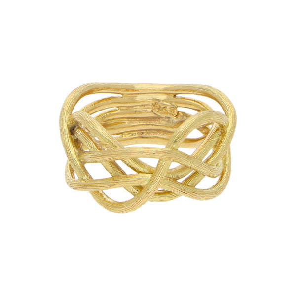 Anillo estilizado en oro amarillo 18 kilates.