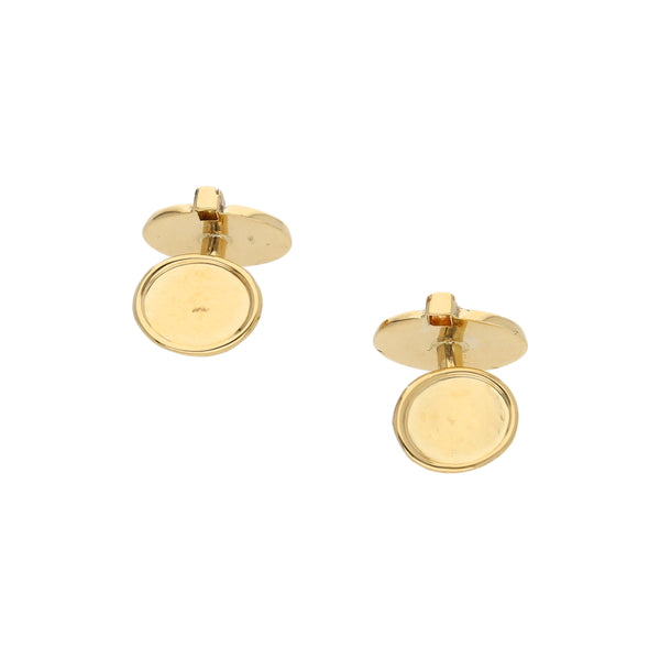 Mancuernillas diseño especial con circonias en oro amarillo 18 kilates.