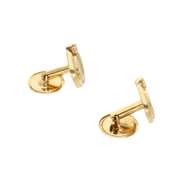 Mancuernillas diseño especial con circonias en oro amarillo 18 kilates.