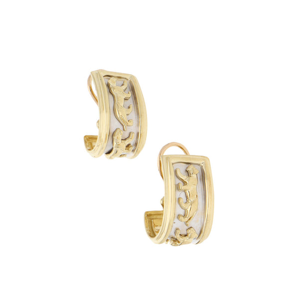 Aretes estilizados motivo felino en oro amarillo 14 kilates.