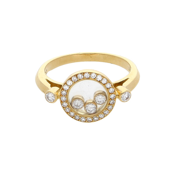 Anillo estilizado con diamantes en oro amarillo 18 kilates.