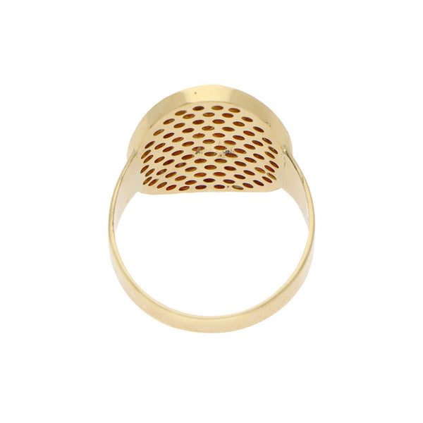 Anillo estilizado con granates en oro amarillo 18 kilates.