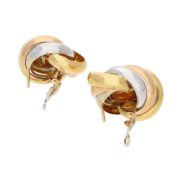Aretes diseño especial en oro tres tonos 18 kilates.