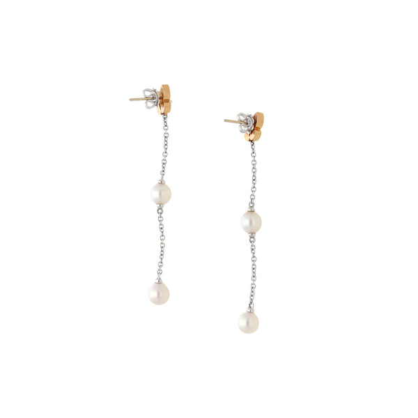 Broqueles diseño especial motivo mariposa con colgantes, diamantes y perlas en oro dos tonos 18 kilates.
