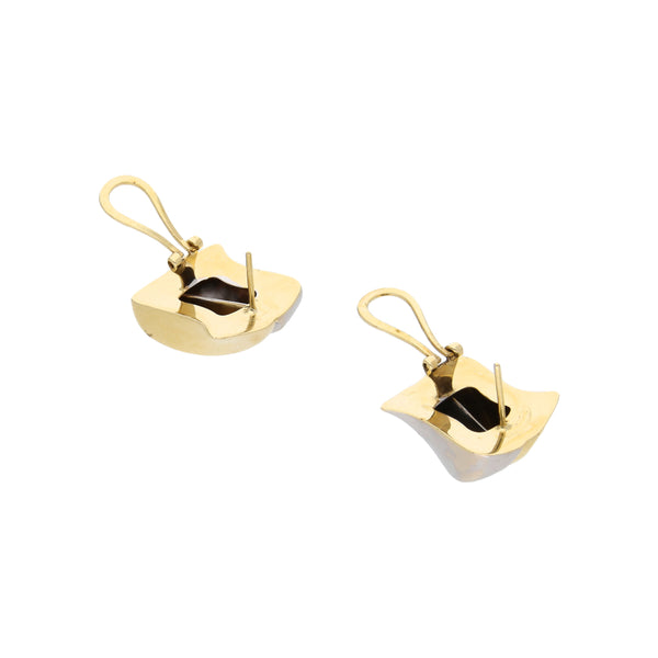 Aretes huecos en oro amarillo 14 kilates.