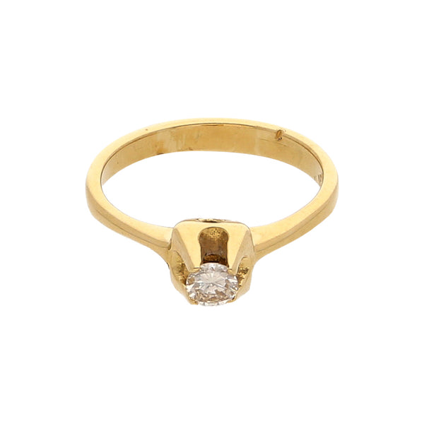 Anillo solitario con diamante en oro amarillo 18 kilates.