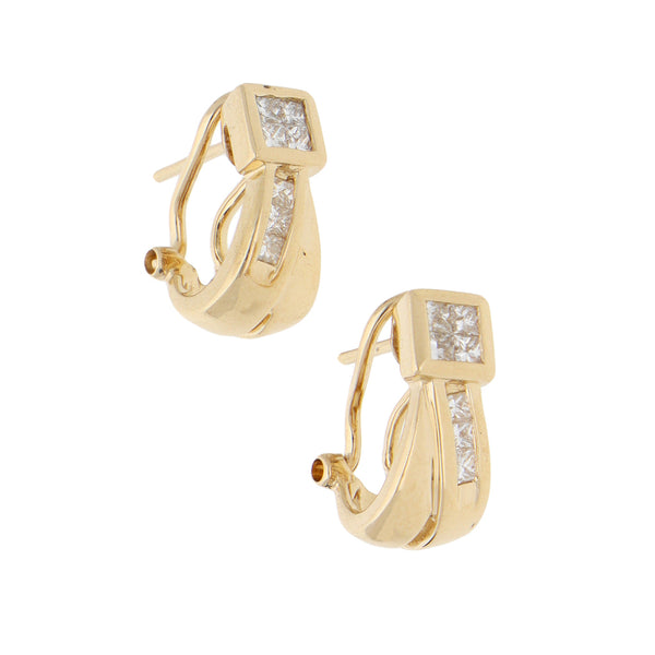 Aretes calados con diamantes en oro amarillo 14 kilates.