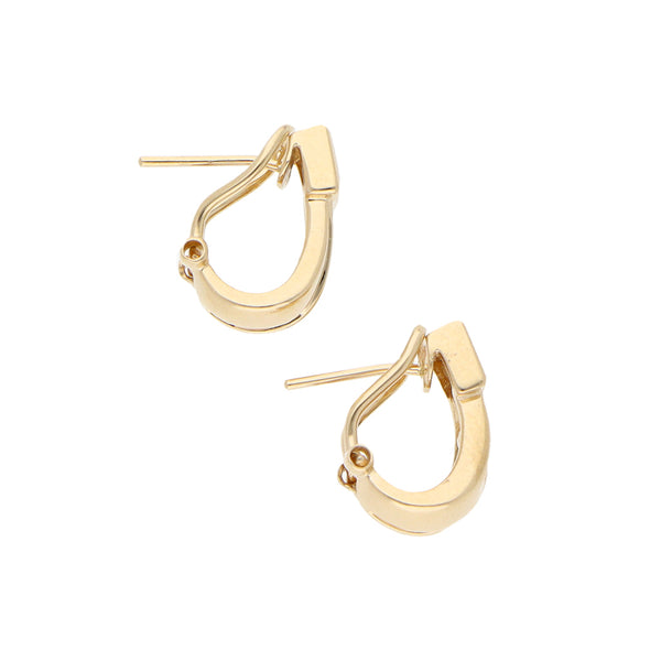 Aretes calados con diamantes en oro amarillo 14 kilates.