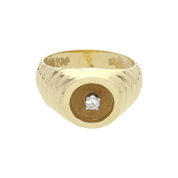 Anillo estilizado con diamante en oro amarillo 14 kilates.