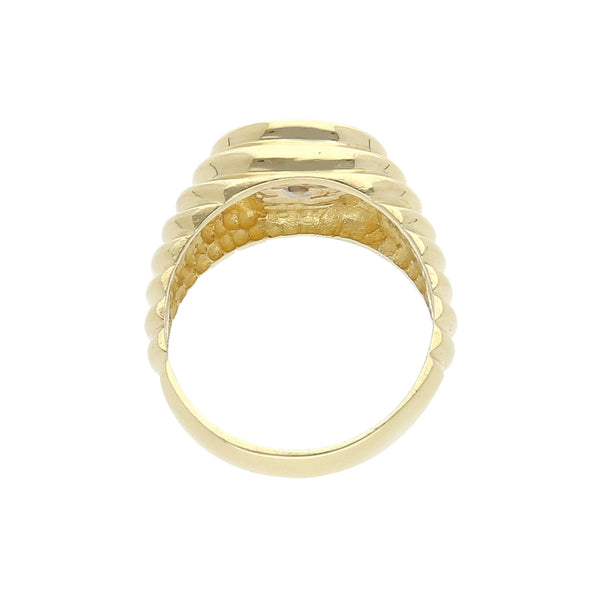 Anillo estilizado con diamante en oro amarillo 14 kilates.