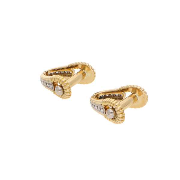 Mancuernillas diseño especial con diamantes en oro amarillo 18 kilates.