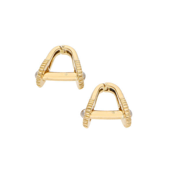 Mancuernillas diseño especial con diamantes en oro amarillo 18 kilates.