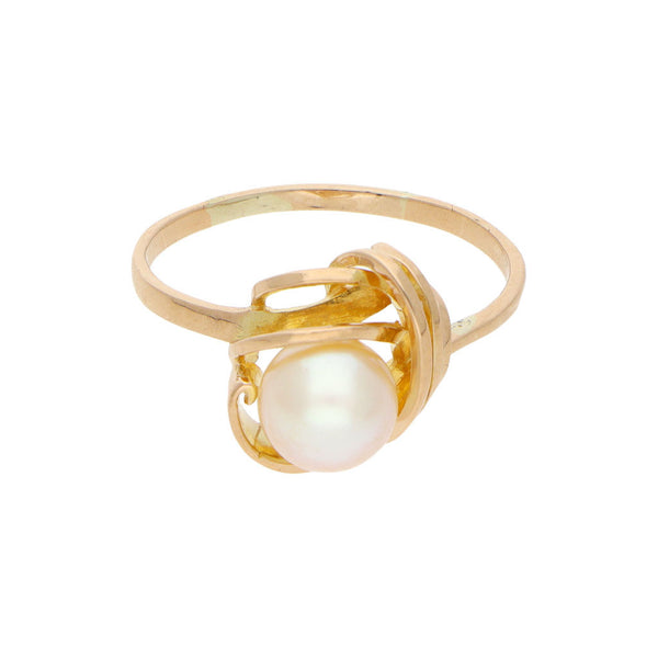 Anillo calado con perla en oro amarillo 18 kilates.