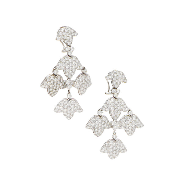 Aretes articulados con diamantes en oro blanco 18 kilates.