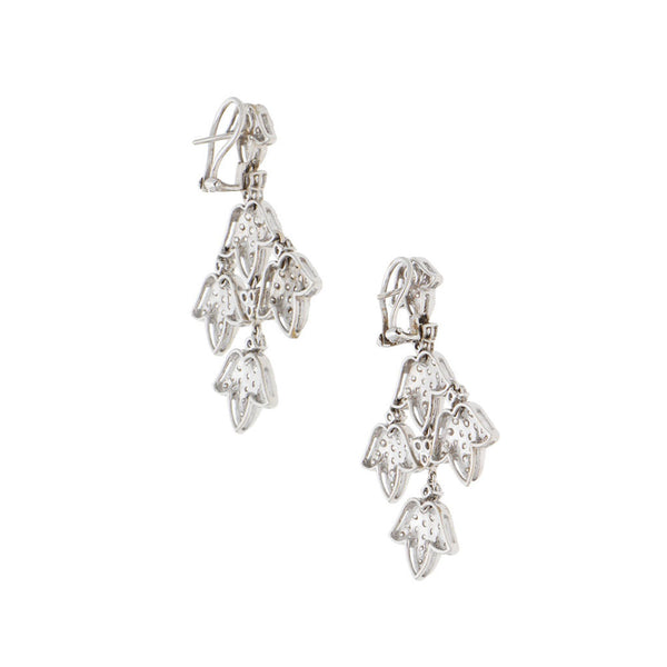 Aretes articulados con diamantes en oro blanco 18 kilates.