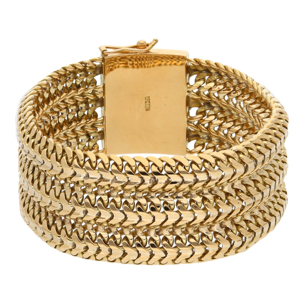 Pulsera eslabón tejido en oro amarillo 18 kilates.