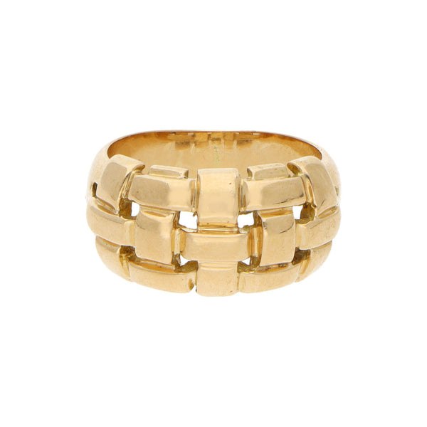 Anillo calado firma Tane en oro amarillo 18 kilates.